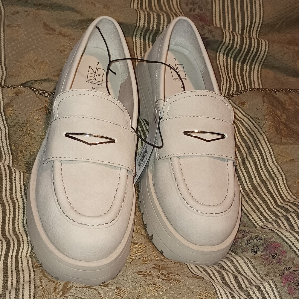 New size 7 cream colored lug loafers by No Boundaries